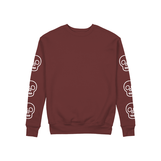 Sudadera cuello redondo calavera bordado en mangas